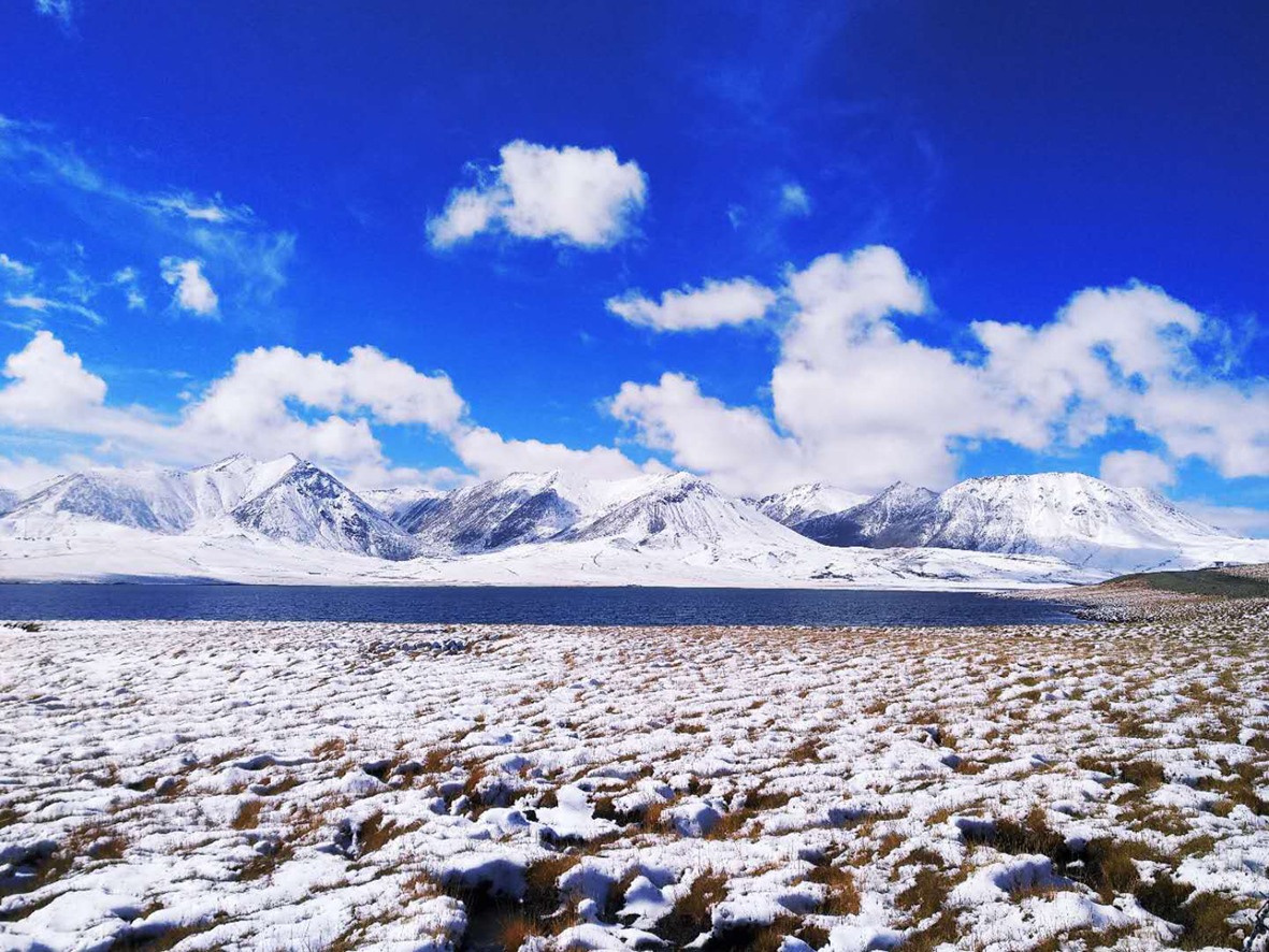 《木里雪景》