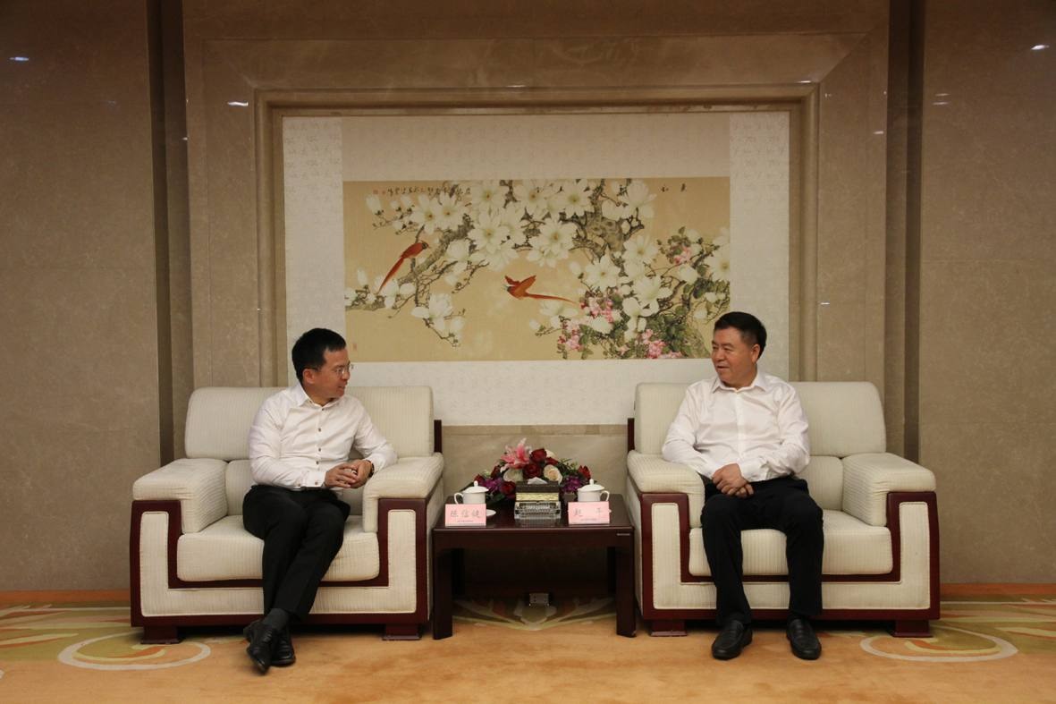 赵平会见兴业银行副行长陈信健